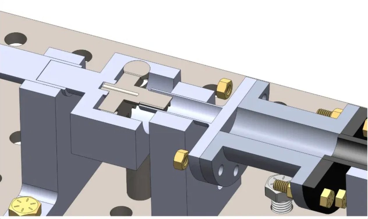 Close-up CAD detail of the fixture blocks and shaft coupling